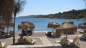 Beach nearby, beach umbrellas, beach towels