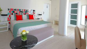 Ropa de cama de alta calidad, minibar, caja fuerte y escritorio