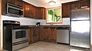 Full-sized fridge, microwave, hob, coffee/tea maker