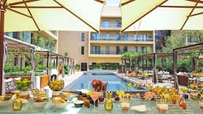 Outdoor pool, open 8:00 AM to 7:00 PM, pool umbrellas, pool loungers