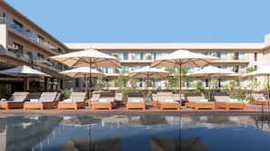 Outdoor pool, open 8:00 AM to 7:00 PM, pool umbrellas, pool loungers