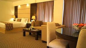 Premium bedding, down comforters, minibar, in-room safe