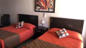 Cortinas opacas, wifi gratis, ropa de cama y acceso en silla de ruedas