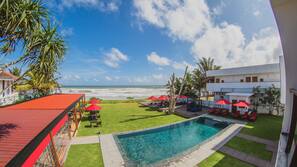 Outdoor pool, free cabanas, pool umbrellas