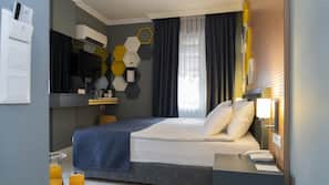 Premium bedding, minibar, iron/ironing board, linens