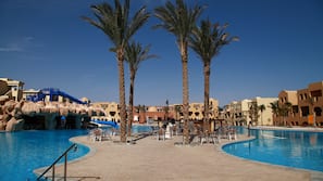 8 outdoor pools, pool umbrellas, pool loungers