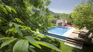 Outdoor pool, pool umbrellas, sun loungers