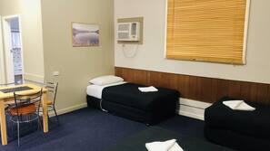 Desk, blackout curtains, iron/ironing board, cots/infant beds