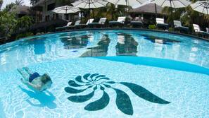 Outdoor pool, pool umbrellas, sun loungers