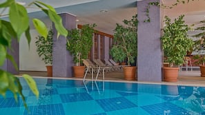 Indoor pool, outdoor pool, pool umbrellas, pool loungers