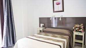 Escritorio, wifi gratis, ropa de cama