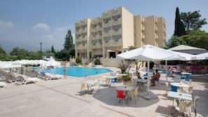 Outdoor pool, open 7 AM to 7 PM, pool umbrellas, sun loungers