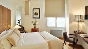 Premium bedding, in-room safe, individually decorated