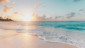On the beach, black sand, beach shuttle, beach cabanas