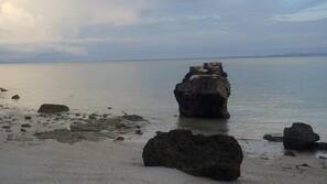 Private beach, white sand, sun-loungers, beach umbrellas
