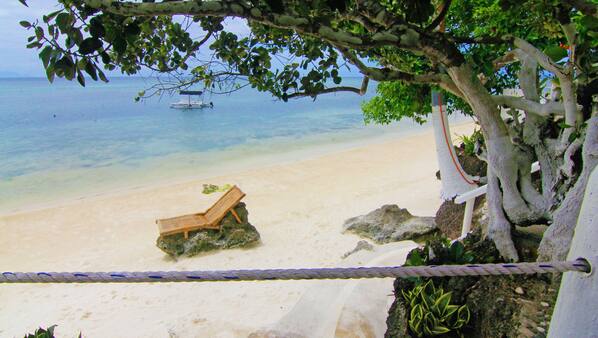 On the beach, sun loungers, beach umbrellas, beach towels