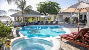 Outdoor pool, pool umbrellas, sun loungers