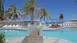 Outdoor pool, pool umbrellas, sun loungers
