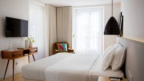 Ropa de cama de alta calidad, minibar, caja fuerte
