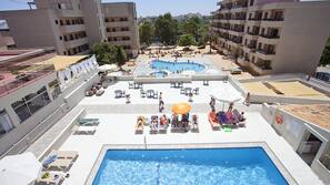 2 outdoor pools, pool umbrellas, pool loungers