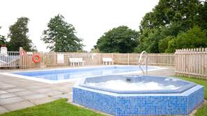 Indoor pool, seasonal outdoor pool, pool umbrellas, pool loungers