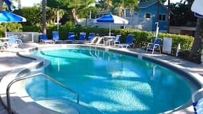 Outdoor pool, pool umbrellas, sun loungers