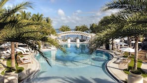 Outdoor pool, free cabanas, pool umbrellas