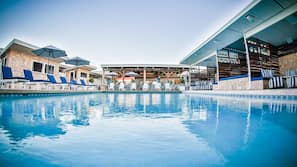 Outdoor pool, free pool cabanas, pool umbrellas