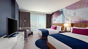 Premium bedding, down comforters, pillowtop beds, in-room safe