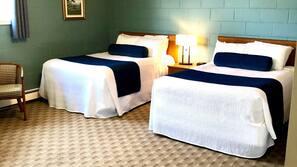 Blackout curtains, iron/ironing board, free WiFi, linens