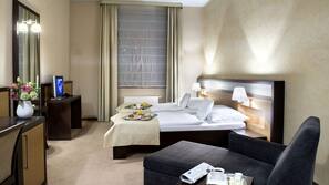 Minibar, coffre-forts dans les chambres, bureau