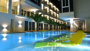 2 outdoor pools, open 8:00 AM to 9:00 PM, pool loungers