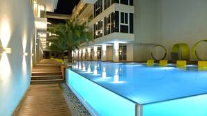 2 outdoor pools, open 8:00 AM to 9:00 PM, pool loungers