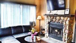 Flat-screen TV, fireplace