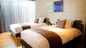 Premium bedding, down comforters, pillowtop beds, free minibar
