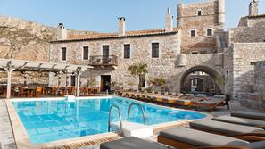 Outdoor pool, pool umbrellas, sun loungers