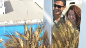 Seasonal outdoor pool, open 9:00 AM to 7:00 PM, sun loungers