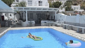 Seasonal outdoor pool, open 9:00 AM to 7:00 PM, sun loungers