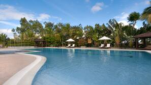 Outdoor pool, free cabanas, pool umbrellas