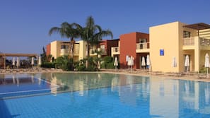 2 outdoor pools, pool umbrellas, pool loungers