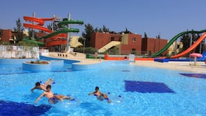 2 outdoor pools, pool umbrellas, pool loungers