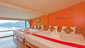 Minibar, cortinas opacas, ropa de cama
