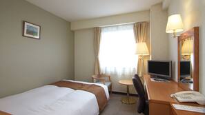 Desk, blackout drapes, soundproofing, free WiFi