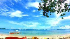 On the beach, sun-loungers, snorkelling, beach volleyball