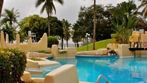 Outdoor pool, pool umbrellas, sun loungers
