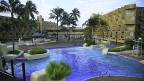 Outdoor pool, pool umbrellas, sun loungers