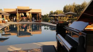 Outdoor pool, pool umbrellas, pool loungers