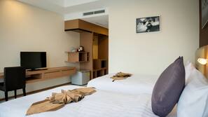 Premium bedding, in-room safe, individually furnished, blackout curtains