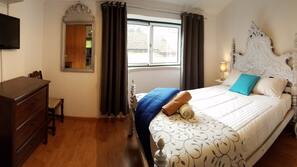 Ropa de cama de alta calidad y cortinas opacas
