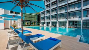 Outdoor pool, pool umbrellas, pool loungers
